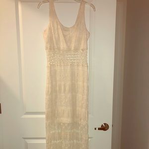 Cream colored floor length lace summer dress.